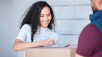 Customer happily receiving delivery on time